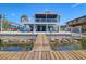 Waterfront home with a private dock and spacious outdoor entertainment area at 6622 Seaview Blvd, Hudson, FL 34667