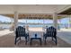 Covered patio features seating, views, and a relaxing ambiance by the water at 6622 Seaview Blvd, Hudson, FL 34667