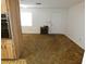 Living room features carpeted floor and a single door leading outside at 6636 Timbercove Ln # 6636, New Port Richey, FL 34653