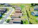 An aerial view of a neighborhood showcasing homes with spacious backyards, perfect for outdoor activities and relaxation at 680 Argyll Dr, Spring Hill, FL 34609