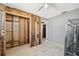Bedroom featuring plank floors, exposed studs in the wall, and a ceiling fan at 6816 Sanderling Ln, Hudson, FL 34667
