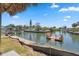 Exterior of dock on the canal showcasing backyard patio space at 6816 Sanderling Ln, Hudson, FL 34667