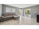Comfortable living space with a neutral color palette and a mix of natural light at 6816 Sanderling Ln, Hudson, FL 34667