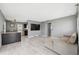 Open living area with new flooring and neutral tones, awaiting personalization at 6816 Sanderling Ln, Hudson, FL 34667
