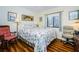 Inviting bedroom featuring a bed, a window, and decor at 7529 Greystone Dr # A, Hudson, FL 34667