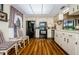 Efficient kitchen featuring modern appliances, ample counter space, and warm wood-look flooring at 7529 Greystone Dr # A, Hudson, FL 34667