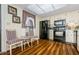Bright kitchen with updated appliances, lighting, and faux wood flooring at 7529 Greystone Dr # A, Hudson, FL 34667