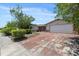Charming single-story home with a two-car garage and a well-maintained front yard, offers classic curb appeal at 9001 Lido Ln, Port Richey, FL 34668