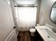 Cozy bathroom features a shower with white tiling and a modern vanity with a bright countertop at 9089 Dupont Ave, Spring Hill, FL 34608