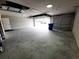 Spacious garage with ample room for parking and storage, featuring a clean and organized layout at 9089 Dupont Ave, Spring Hill, FL 34608