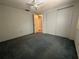 Large bedroom with a ceiling fan, carpet flooring, and a closet is perfect for relaxing and resting at 9104 Lido Ln, Port Richey, FL 34668