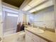 Bright bathroom with shower and tub combination and neutral color palette at 9237 Penelope Dr, Weeki Wachee, FL 34613