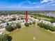 An aerial view shows the property located within a picturesque waterfront community at 9336 Santa Monica Way, New Port Richey, FL 34655