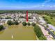 An aerial view of the property's location within a picturesque waterfront community at 9336 Santa Monica Way, New Port Richey, FL 34655