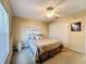 Bedroom with neutral decor, ceiling fan and large closet at 9336 Santa Monica Way, New Port Richey, FL 34655