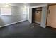 Bedroom with carpet flooring, closet, and natural light at 9441 Teak St, New Port Richey, FL 34654