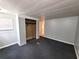 Cozy bedroom with a built-in closet and carpeting, ready for personalization at 9441 Teak St, New Port Richey, FL 34654
