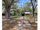 Charming single Gathering home with a fenced yard and mature trees at 9441 Teak St, New Port Richey, FL 34654