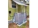 Exterior shot of the home's air conditioning unit at 9441 Teak St, New Port Richey, FL 34654