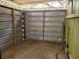 View of the storage room under the carport at 9441 Teak St, New Port Richey, FL 34654