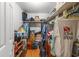 Organized walk-in closet offering ample storage space for clothes and accessories at 9640 Northcliffe Blvd, Spring Hill, FL 34608