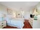 Spacious bedroom with light blue and white walls and wood floors at 9652 Oakwood Hills Ct, New Port Richey, FL 34655