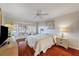 Bedroom with striped wallpaper and bay window at 9652 Oakwood Hills Ct, New Port Richey, FL 34655