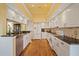 Bright kitchen with white cabinets and modern appliances at 9652 Oakwood Hills Ct, New Port Richey, FL 34655