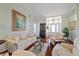 Comfortable living room with hardwood floors and an elegant decor at 9652 Oakwood Hills Ct, New Port Richey, FL 34655