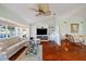 Open concept living room with built-in shelving at 9652 Oakwood Hills Ct, New Port Richey, FL 34655