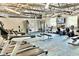 A modern gym with various fitness equipment, including treadmills, bikes, and weight machines, promoting a healthy lifestyle at 11041 Paradise Point Way, New Port Richey, FL 34654