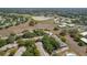 Scenic aerial view of the townhome community, complete with a picturesque pond nearby at 11241 Dollar Lake Dr # 5, Port Richey, FL 34668