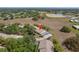 Aerial view of neighborhood near a pond, highlighting the property's prime location at 11241 Dollar Lake Dr # 5, Port Richey, FL 34668