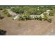 Aerial view of townhome community with lush landscaping, convenient parking, and a peaceful setting at 11241 Dollar Lake Dr # 5, Port Richey, FL 34668