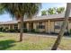 Charming single-story villa featuring a well-maintained lawn and welcoming front entrance at 11241 Dollar Lake Dr # 5, Port Richey, FL 34668