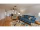 Comfortable living room showcases a spacious layout with connection to the dining area at 11241 Dollar Lake Dr # 5, Port Richey, FL 34668