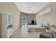 Large primary bedroom with sliding glass doors accessing pool/backyard at 11336 Flower Ave, Weeki Wachee, FL 34613