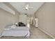 Spacious bedroom with tile floors and light-colored walls at 11336 Flower Ave, Weeki Wachee, FL 34613