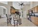 Kitchen island with seating separating kitchen from dining area at 11336 Flower Ave, Weeki Wachee, FL 34613