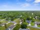 An elevated shot presenting a charming community with well-maintained lawns and mature trees at 12331 Fulmar Rd, Weeki Wachee, FL 34614