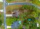 Overhead view of houses with swimming pools and well-kept gardens at 12331 Fulmar Rd, Weeki Wachee, FL 34614