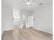 Open bedroom layout with access to closets and bathroom at 12331 Fulmar Rd, Weeki Wachee, FL 34614