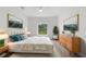 Cozy main bedroom with a window, wood accents, and stylish decor at 12331 Fulmar Rd, Weeki Wachee, FL 34614