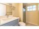 Bathroom with shower, modern sink, and natural light at 12709 Castleberry Ct, Hudson, FL 34667