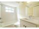 Bathroom with tub, shower, modern sink, and natural light at 12709 Castleberry Ct, Hudson, FL 34667