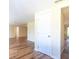 Spacious living room features laminated floors and neutral paint tones at 12709 Castleberry Ct, Hudson, FL 34667
