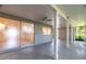 Screened patio featuring a ceiling fan and a view of the backyard at 12709 Castleberry Ct, Hudson, FL 34667