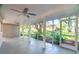 Screened patio offering natural light and a view of the backyard at 12709 Castleberry Ct, Hudson, FL 34667