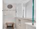 Modern shower with glass enclosure, rainfall shower head, and built-in niche at 12889 Burns Dr, Odessa, FL 33556