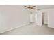 Bright bedroom boasts neutral walls and plush carpeting, providing a cozy and inviting space at 13098 Hanley Dr, Spring Hill, FL 34609